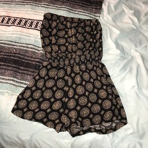 black strapless romper with gold mandalas